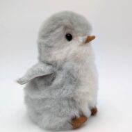 Alpaca fur stuffed penguin sitting looking cute
