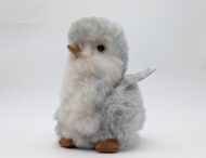 Alpaca fur stuffed penguin sitting looking cute