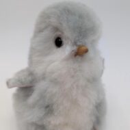 Alpaca fur stuffed penguin sitting looking cute
